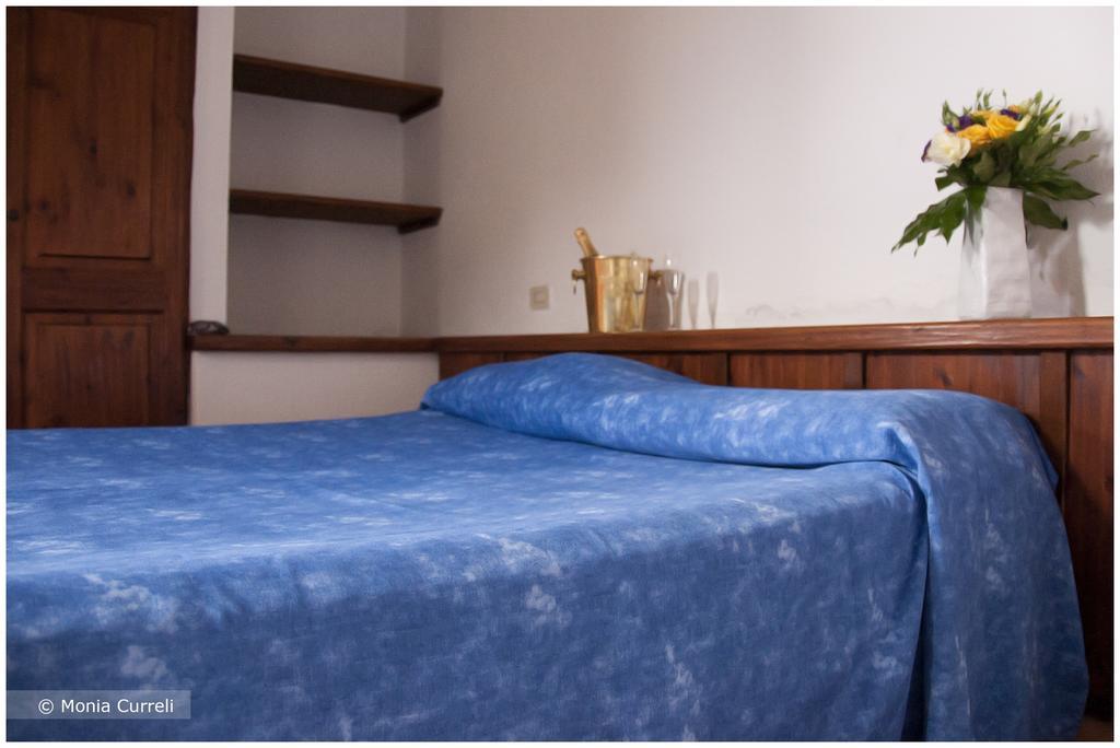 Hotel Camping Baia Saraceno Palau Pokoj fotografie