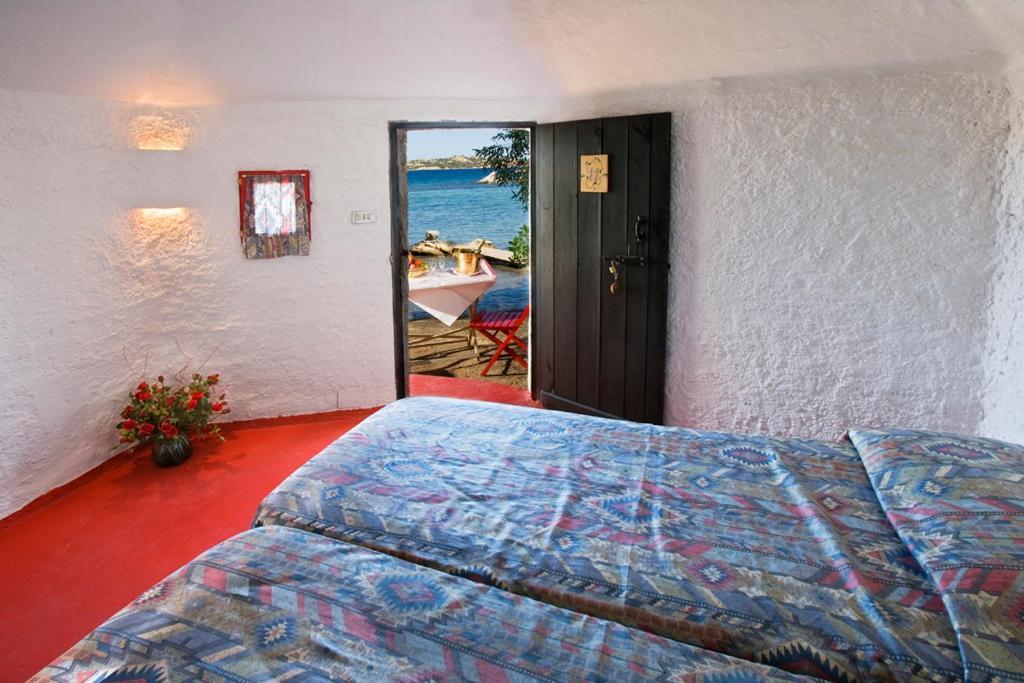 Hotel Camping Baia Saraceno Palau Pokoj fotografie